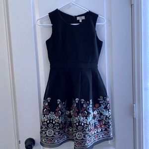SOLD Girls tea length black dress with embroidery